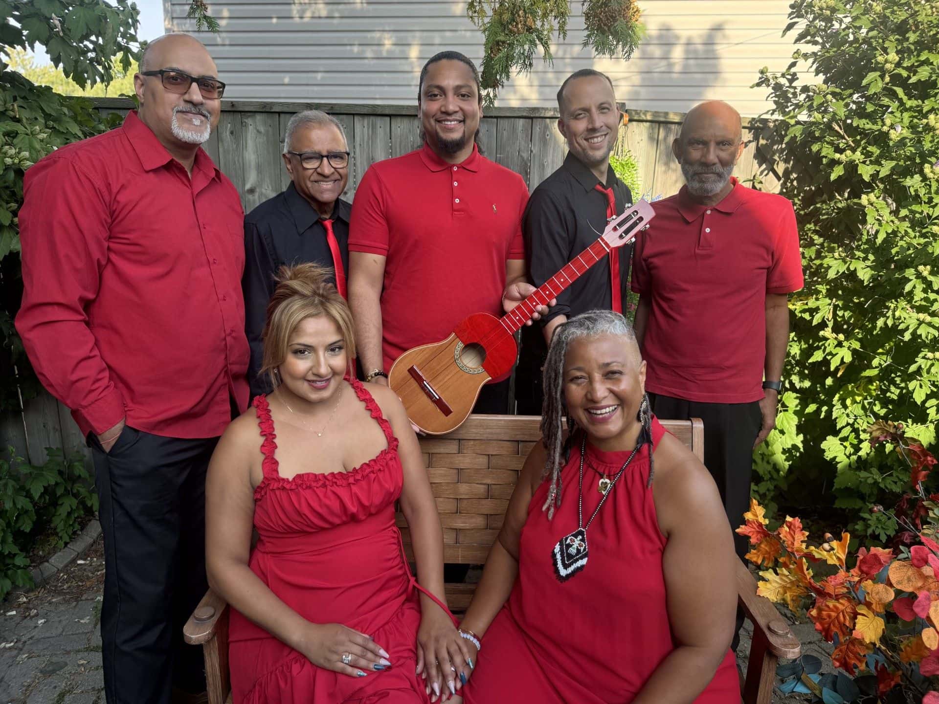Group photo of Caribbean Winterfest performers, Maestra and Friends.